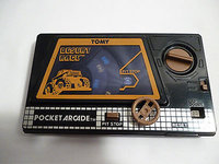 vintage-pocket-arcade-wind-up-hand-held-game-tomy-desert-race.jpg