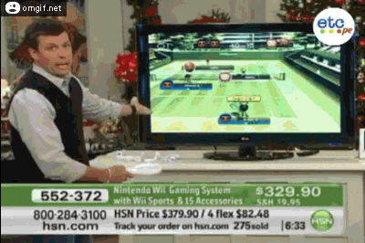 doing-it-wrong-tennis-wii.gif