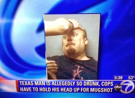 man+so+drunk+cops+hold+head+up+for+mug+shot+dr+heckle+funny+wtf+news+reports.jpg